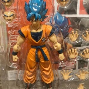 Super Warrior Action Figure with Blue Hair and Orange Outfit